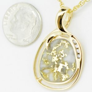 This fine piece of jewelry is a gold quartz pendant featuring diamonds