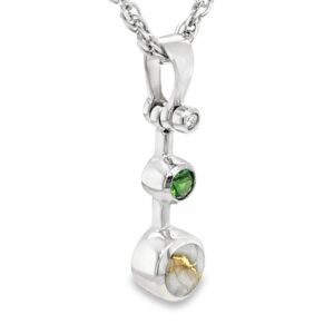 This white gold tsavorite gold quartz necklace is a stunning piece to add to your collection
