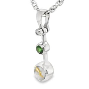 This white gold tsavorite gold quartz necklace is a stunning piece to add to your collection