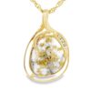 This fine piece of jewelry is a gold quartz pendant featuring diamonds